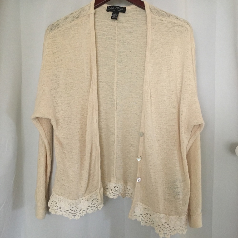Beige cardigan with crochet detailing